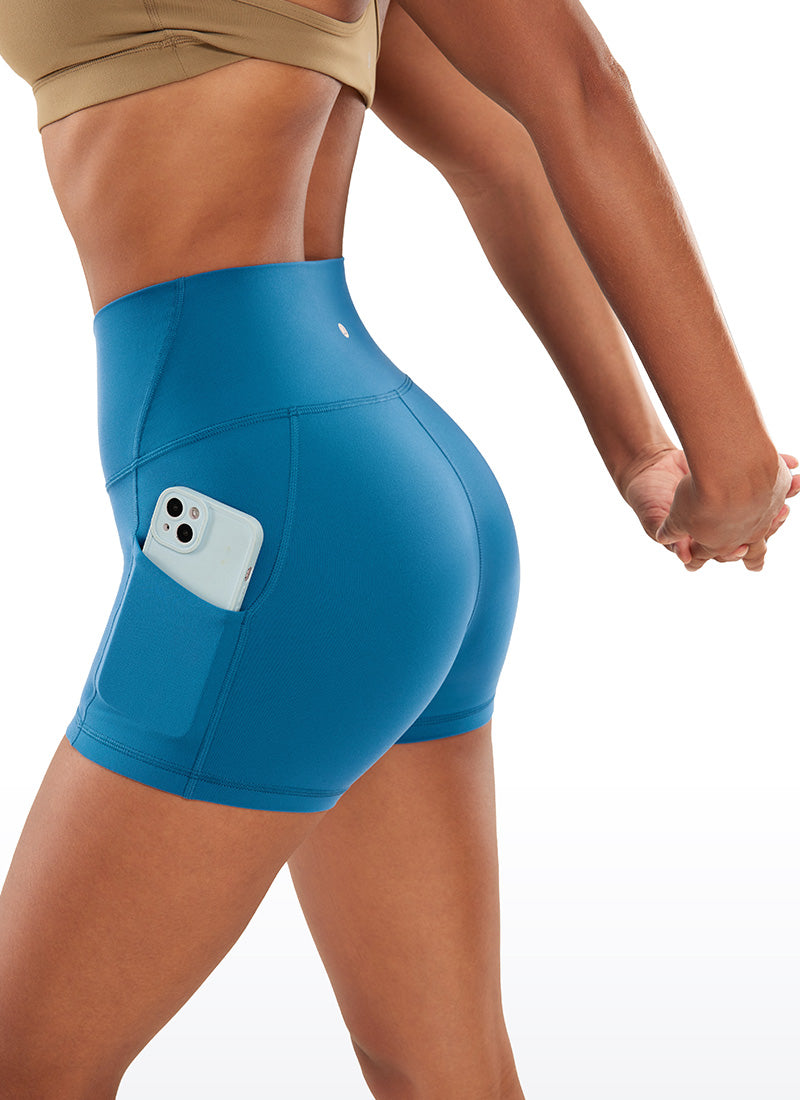 CRZ YOGA กางเกงขาสั้นโยคะสำหรับผู้หญิง แบบ High Rise BikerButterluxe Pockets 3'' Super-sonic Blue